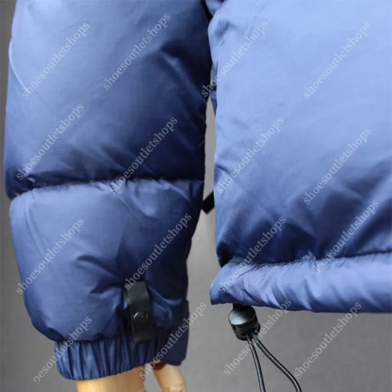 Down Jacket 1996 Diseñador de chaqueta Nuevos hombres y mujeres engrosados ​​500 pato blanco con capucha hojaldre caliente abrig